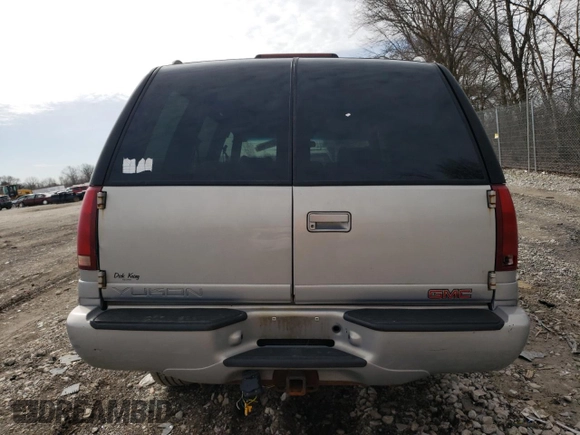 1999 GMC Denali with VIN 1GKEK13R0XR915053, listed as a Copart auction lot 49241145 with 2,664,121 mi miles and Salvage Title. Bid and sale history available at carsss.com. Image 6.