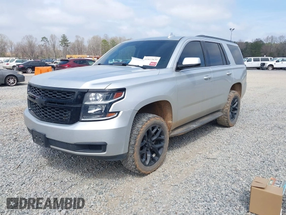 2016 Chevrolet Tahoe LS with VIN 1GNSCAKC5GR354722, listed as a IAAI auction lot 41812839 with 146,533 mi miles and . Bid and sale history available at DreamBid. Image 18.