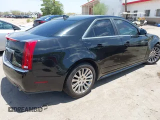 2012 Cadillac CTS Premium with VIN 1G6DP5E35C0129064, listed as a IAAI auction lot 42666308 with 151,694 mi miles and . Bid and sale history available at DreamBid. Image 4.