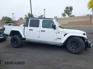 2020 Jeep Gladiator Sport S with VIN 1C6HJTAG9LL194454, listed as a IAAI auction lot 42430339 with 90,461 mi miles and . Bid and sale history available at DreamBid. Image 14.
