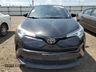 2018 Toyota C-HR XLE with VIN NMTKHMBX0JR014576, listed as a Copart auction lot 63263215 with 95,649 mi miles and Clean title. Bid and sale history available at DreamBid. Image 5.