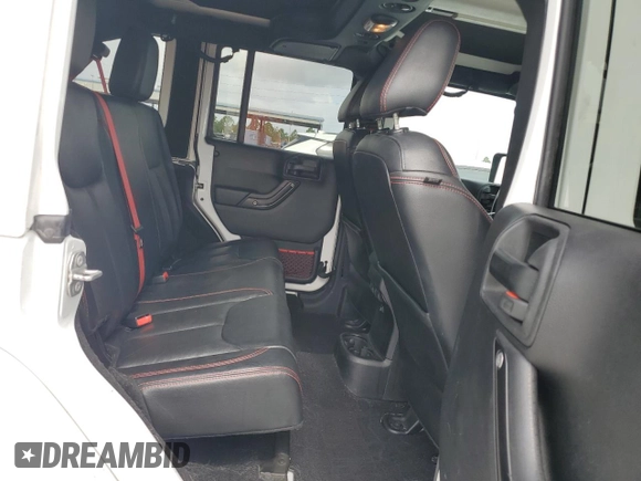 2017 Jeep Wrangler Unlimited Rubicon z VIN 1C4HJWFG6HL692928, wystawiony jako Copart lot #60049775 z przebiegiem 145 033 mil mil oraz Nie do naprawy • Non repairable. Historia ofert i sprzedaży dostępna na DreamBid. Obrazek 10.