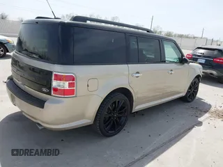 2018 Ford Flex SEL z VIN 2FMGK5C8XJBA11784, wystawiony jako IAAI lot #41838739 z przebiegiem 162 559 mil mil oraz . Historia ofert i sprzedaży dostępna na DreamBid. Obrazek 4.