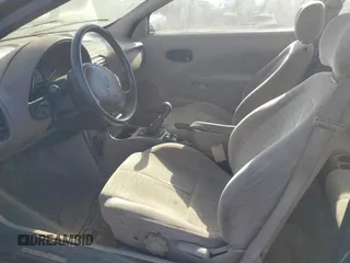 1999 Saturn SC with VIN 1G8ZR1274XZ262181, listed as a Copart auction lot 75931774 with Not Provided miles and Salvage Title. Bid and sale history available at carsss.com. Image 7.