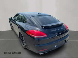 2016 Porsche Panamera 4 z VIN WP0AA2A71GL000493, wystawiony jako Copart lot #57187295 z przebiegiem 84 384 mil mil oraz Czysty tytuł • Clean title. Historia ofert i sprzedaży dostępna na DreamBid. Obrazek 3.