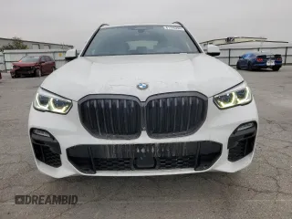2020 BMW X5 M50i with VIN 5UXJU4C00LL228142, listed as a Copart auction lot 81246294 with 86,014 mi miles and Clean Title. Bid and sale history available at DreamBid. Image 5.