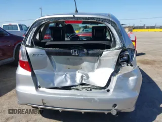 2013 Honda Fit with VIN JHMGE8H31DC042192, listed as a IAAI auction lot 42036582 with 63,223 mi miles. Bid and sale history available at carsss.com. Image 6.