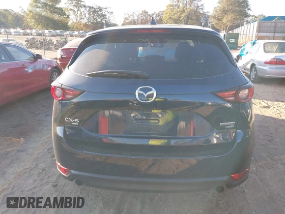 2021 Mazda CX-5 Grand Touring Reserve with VIN JM3KFBAYXM0465762, listed as a IAAI auction lot 40728368 with 30,667 mi miles. Bid and sale history available at carsss.com. Image 16.