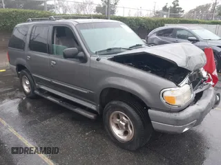 1999 Ford Explorer XLT z VIN 1FMZU32E1XZA45441, wystawiony jako IAAI lot #41501278 z przebiegiem 153 062 mil mil oraz . Historia ofert i sprzedaży dostępna na DreamBid. Obrazek 1.