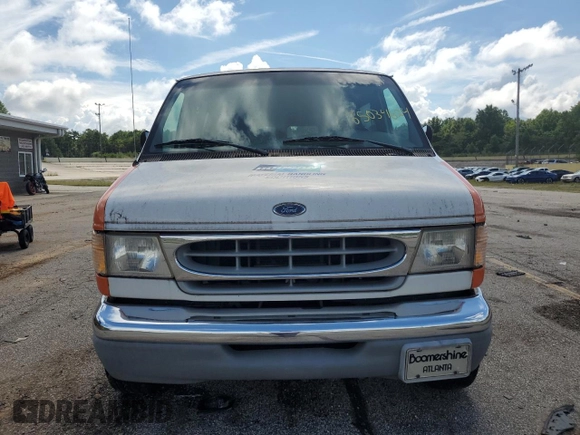 1999 Ford Econoline Passenger XL with VIN 1FBSS31L3XHA02788, listed as a Copart auction lot 65034624 with 109,401 mi miles and Non Repairable. Bid and sale history available at DreamBid. Image 5.