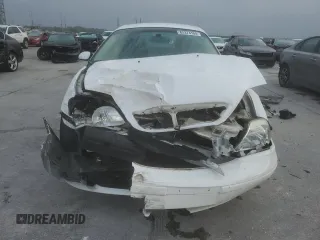 2003 Mercury Sable z VIN 1MEHM50U03G607064, wystawiony jako Copart lot #82373104 z przebiegiem 103 150 mil mil oraz Szkoda całkowita • Salvage title. Historia ofert i sprzedaży dostępna na DreamBid. Obrazek 5.