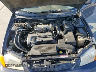 1999 Mazda Protege DX z VIN JM1BJ2227X0106522, wystawiony jako Copart lot #52423565 z przebiegiem 206 260 mil mil oraz Szkoda całkowita • Salvage title. Historia ofert i sprzedaży dostępna na DreamBid. Obrazek 11.