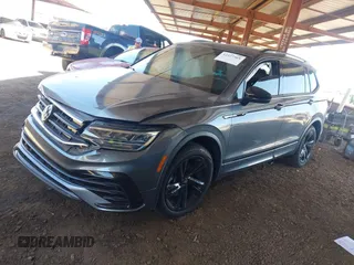 2024 Volkswagen Tiguan SE R-Line Black with VIN 3VVCB7AX4RM046261, listed as a IAAI auction lot 42327569 with 15,428 mi miles and . Bid and sale history available at DreamBid. Image 18.