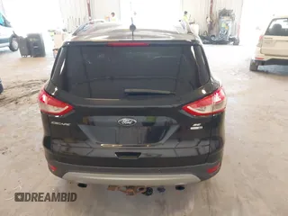 2014 Ford Escape SE with VIN 1FMCU9G95EUA16328, listed as a IAAI auction lot 42464235 with 108,570 mi miles and . Bid and sale history available at DreamBid. Image 16.