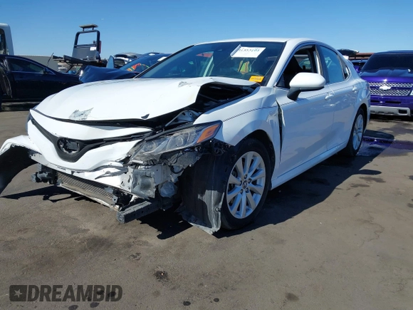 2019 Toyota Camry LE with VIN 4T1B11HK3KU772369, listed as a IAAI auction lot 41353103 with 85,565 mi miles and . Bid and sale history available at DreamBid. Image 16.