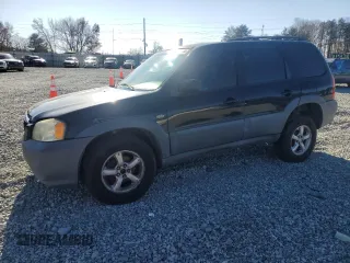 2005 Mazda Tribute i with VIN 4F2YZ02Z05KM38128, listed as a Copart auction lot 83175604 with 320,405 mi miles and Salvage Title. Bid and sale history available at carsss.com. Image 1.