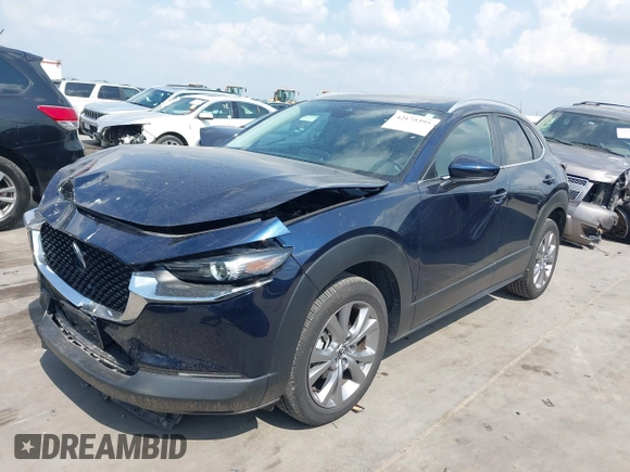 2023 Mazda CX-30 S Carbon Edition with VIN 3MVDMBCM4PM542160, listed as a IAAI auction lot 42175395 with 11,340 mi miles and . Bid and sale history available at DreamBid. Image 17.