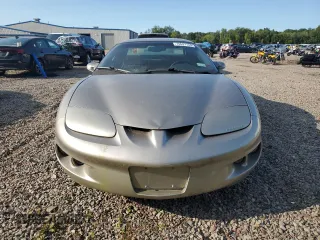 2000 Pontiac Firebird Firebird z VIN 2G2FS22K5Y2116520, wystawiony jako Copart lot #70697134 z przebiegiem 140 412 mil mil oraz Tytuł czysty. Historia ofert i sprzedaży dostępna na DreamBid. Obrazek 5.
