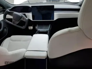 2022 Tesla Model S Plaid with VIN 5YJSA1E62NF490541, listed as a Copart auction lot 51149205 with Not provided miles and Salvage title. Bid and sale history available at DreamBid. Image 8.