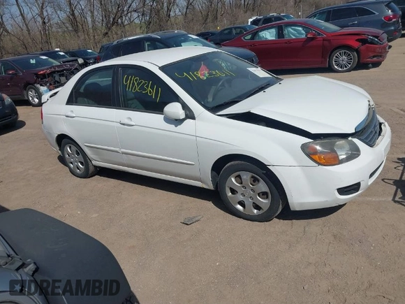 2009 Kia Spectra EX with VIN KNAFE221X95624138, listed as a IAAI auction lot 41823611 with 136,790 mi miles. Bid and sale history available at carsss.com. Image 1.