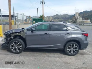 2020 Lexus RX with VIN 2T2HZMAA3LC153100, listed as a IAAI auction lot 41925188 with 104,216 mi miles. Bid and sale history available at carsss.com. Image 14.