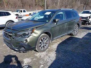 2019 Subaru Outback Touring with VIN 4S4BSATC7K3272301, listed as a IAAI auction lot 41318172 with 102,417 mi miles and . Bid and sale history available at DreamBid. Image 18.