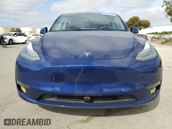 2021 Tesla Model Y Long Range with VIN 5YJYGDEEXMF192447, listed as a Copart auction lot 53550055 with 65,673 mi miles and Salvage Title. Bid and sale history available at DreamBid. Image 5.