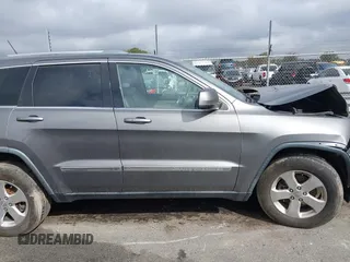 2012 Jeep Grand Cherokee Laredo with VIN 1C4RJFAG8CC298268, listed as a IAAI auction lot 40787833 with 206,486 mi miles. Bid and sale history available at carsss.com. Image 12.