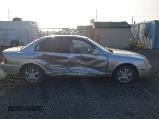 2004 Kia Optima LX z VIN KNAGD126045302372, wystawiony jako IAAI lot #41022315 z przebiegiem 199 588 mil mil oraz . Historia ofert i sprzedaży dostępna na DreamBid. Obrazek 14.