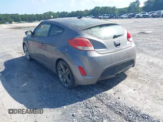 2016 Hyundai Veloster with VIN KMHTC6AD5GU252043, listed as a IAAI auction lot 42810862 with 128,098 mi miles and . Bid and sale history available at DreamBid. Image 3.