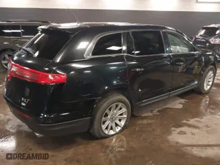 2018 Lincoln MKT with VIN 2LMHJ5NK8JBL02014, listed as a IAAI auction lot 41489437 with 298,510 mi miles. Bid and sale history available at carsss.com. Image 4.