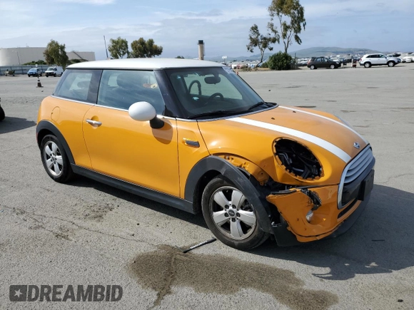 2014 MINI Hardtop with VIN WMWXM5C58ET933445, listed as a Copart auction lot 52769425 with 55,391 mi miles and Salvage Title. Bid and sale history available at DreamBid. Image 4.