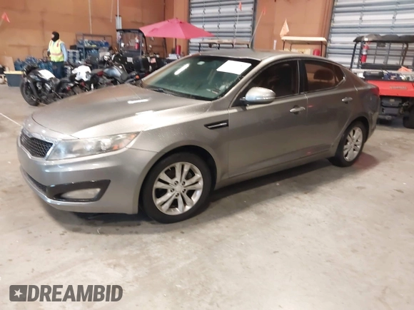 2013 Kia Optima EX with VIN 5XXGN4A74DG165525, listed as a IAAI auction lot 42405482 with 132,820 mi miles and . Bid and sale history available at DreamBid. Image 2.