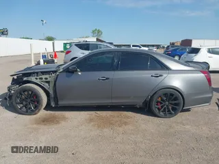 2018 Cadillac CTS-V z VIN 1G6A15S63J0101442, wystawiony jako IAAI lot #41964961 z przebiegiem 87 821 mil mil oraz . Historia ofert i sprzedaży dostępna na DreamBid. Obrazek 14.