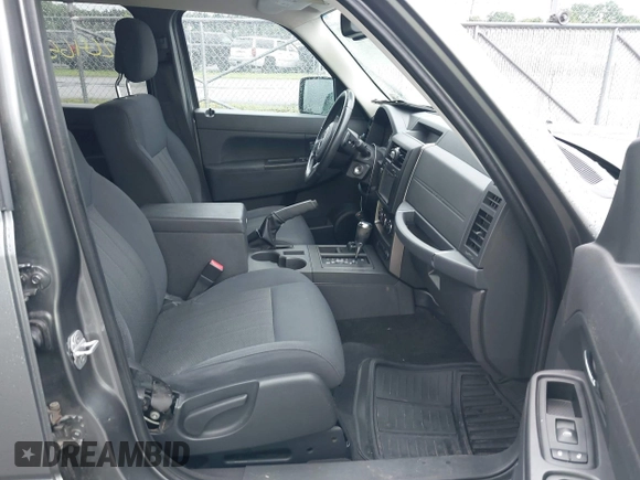 2012 Jeep Liberty Sport with VIN 1C4PJMAK2CW118636, listed as a IAAI auction lot 42646591 with 170,607 mi miles and . Bid and sale history available at DreamBid. Image 5.
