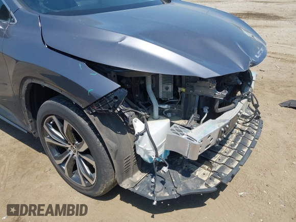 2021 Lexus RX 450h with VIN 2T2HGMDA6MC065516, listed as a IAAI auction lot 42162407 with 81,501 mi miles and . Bid and sale history available at DreamBid. Image 18.