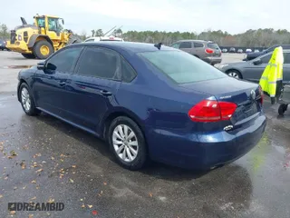 2014 Volkswagen Passat Wolfsburg Ed with VIN 1VWAT7A3XEC085932, listed as a IAAI auction lot 41567573 with 165,154 mi miles. Bid and sale history available at carsss.com. Image 3.