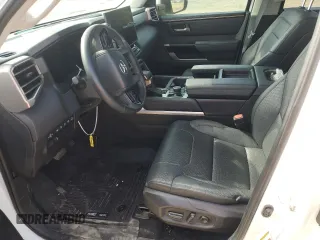 2023 Toyota Tundra Limited Hybrid with VIN 5TFJC5DBXPX022822, listed as a Copart auction lot 77610044 with 32,908 mi miles and Salvage title. Bid and sale history available at DreamBid. Image 7.