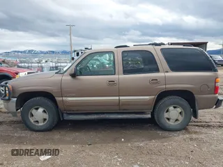 2003 GMC Yukon SLT z VIN 1GKEK13Z93R211332, wystawiony jako IAAI lot #41739150 z przebiegiem Nie podano mil oraz . Historia ofert i sprzedaży dostępna na DreamBid. Obrazek 14.