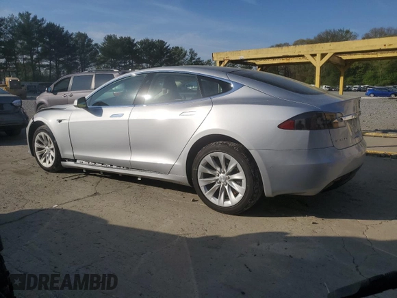 2017 Tesla Model S 100D z VIN 5YJSA1E2XHF213086, wystawiony jako Copart lot #53780875 z przebiegiem 34 205 mil mil oraz Szkoda całkowita • Salvage title. Historia ofert i sprzedaży dostępna na DreamBid. Obrazek 2.