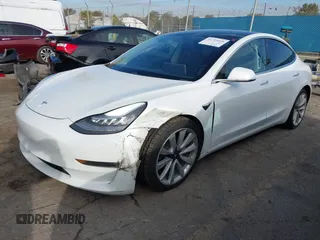 2020 Tesla Model 3 Long Range with VIN 5YJ3E1EB9LF620771, listed as a IAAI auction lot 41795008 with 53,155 mi miles and . Bid and sale history available at DreamBid. Image 19.