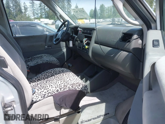 2003 Volkswagen EuroVan MV with VIN WV2NB47003H003131, listed as a IAAI auction lot 42157821 with 166,159 mi miles and . Bid and sale history available at DreamBid. Image 5.