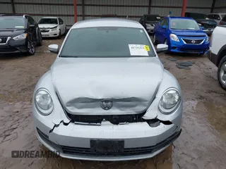 2012 Volkswagen Beetle 2.5L PZEV with VIN 3VWJP7ATXCM601206, listed as a IAAI auction lot 41733311 with 111,742 mi miles. Bid and sale history available at carsss.com. Image 12.