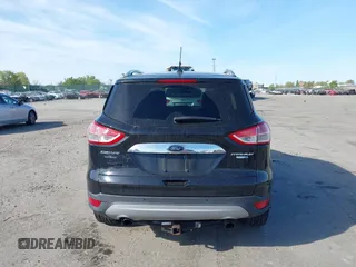 2016 Ford Escape Titanium with VIN 1FMCU9J94GUA06028, listed as a IAAI auction lot 42102769 with 88,278 mi miles. Bid and sale history available at carsss.com. Image 17.