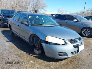 2006 Dodge Stratus SXT z VIN 1B3EL46R76N217889, wystawiony jako IAAI lot #41649392 z przebiegiem 113 317 mil mil oraz . Historia ofert i sprzedaży dostępna na DreamBid. Obrazek 1.