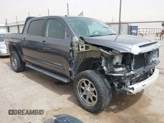 2014 Toyota Tundra SR5 z VIN 5TFEM5F1XEX082020, wystawiony jako IAAI lot #41914391 z przebiegiem 75 787 mil mil oraz . Historia ofert i sprzedaży dostępna na DreamBid. Obrazek 1.