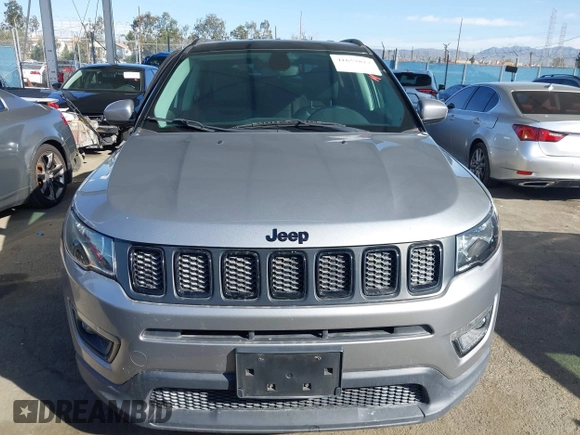 2020 Jeep Compass Latitude w/Sun/Safety Pkg with VIN 3C4NJCBB1LT102627, listed as a IAAI auction lot 41657827 with 68,371 mi miles. Bid and sale history available at carsss.com. Image 12.