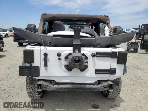 2013 Jeep Wrangler Unlimited Sport with VIN 1C4BJWDG8DL639781, listed as a Copart auction lot 63620025 with 84,720 mi miles and Salvage title. Bid and sale history available at DreamBid. Image 6.