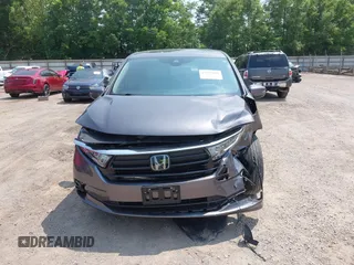 2022 Honda Odyssey Touring z VIN 5FNRL6H83NB023583, wystawiony jako IAAI lot #42425498 z przebiegiem Nie podano mil oraz . Historia ofert i sprzedaży dostępna na DreamBid. Obrazek 11.