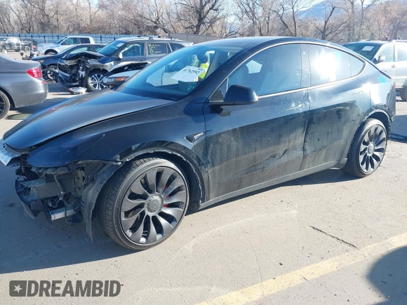 2022 Tesla Model Y Performance with VIN 7SAYGDEF0NF447541, listed as a IAAI auction lot 41762592 with 41,204 mi miles and . Bid and sale history available at DreamBid. Image 21.